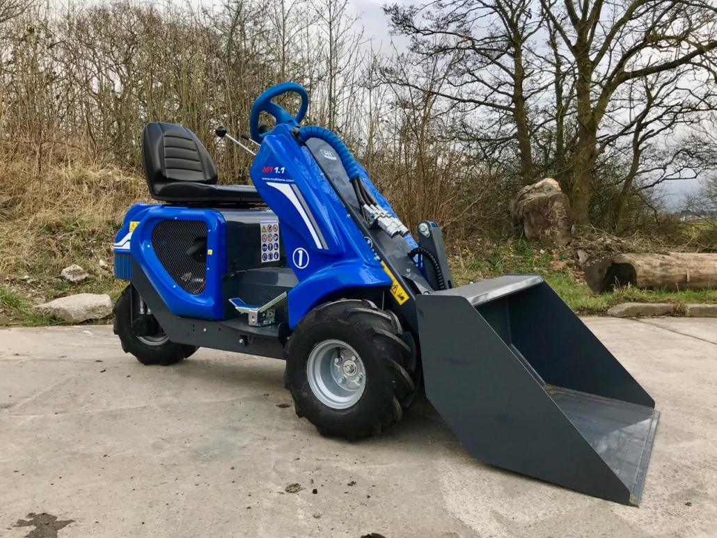 MultiOne mini loader 1 series with bucket full view from right side