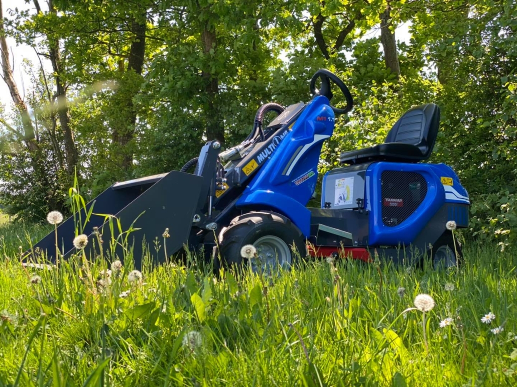 MultiOne mini loader 1 series with bucket full view from left side