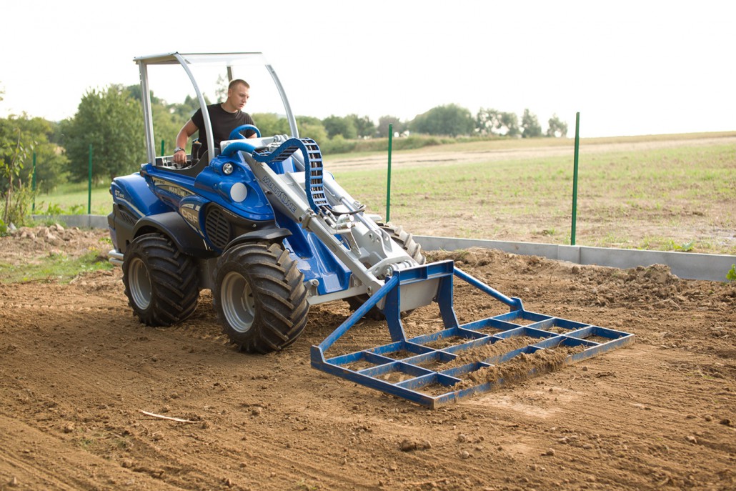 leveller working on soil