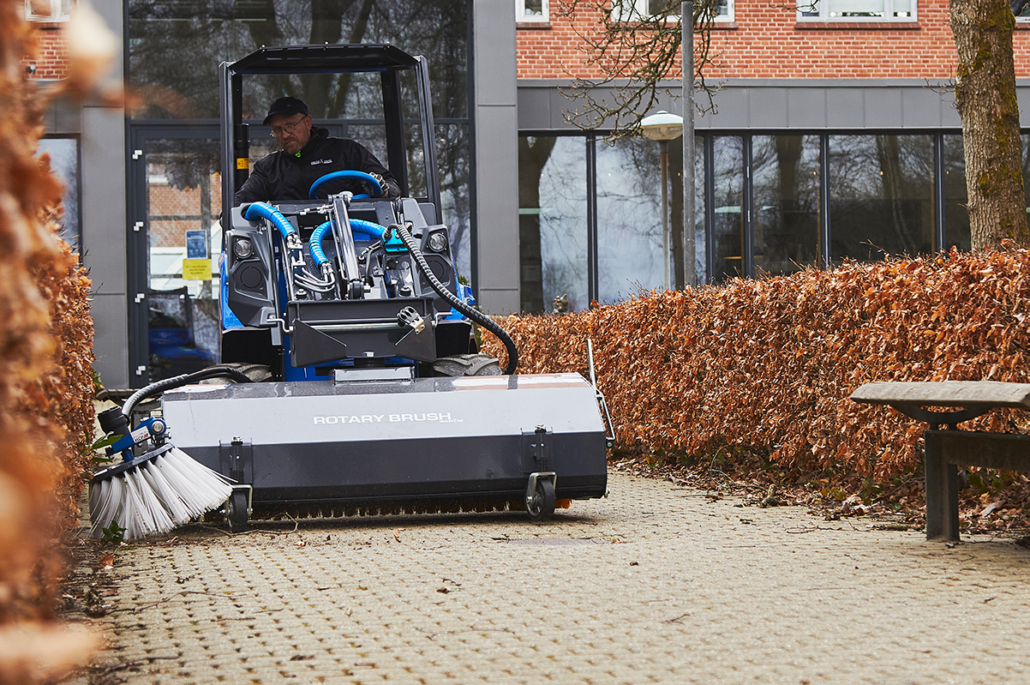 EZ8 sweeper cleaning a side street
