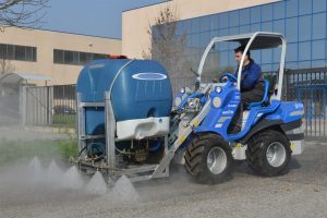 street washer cleaning a street