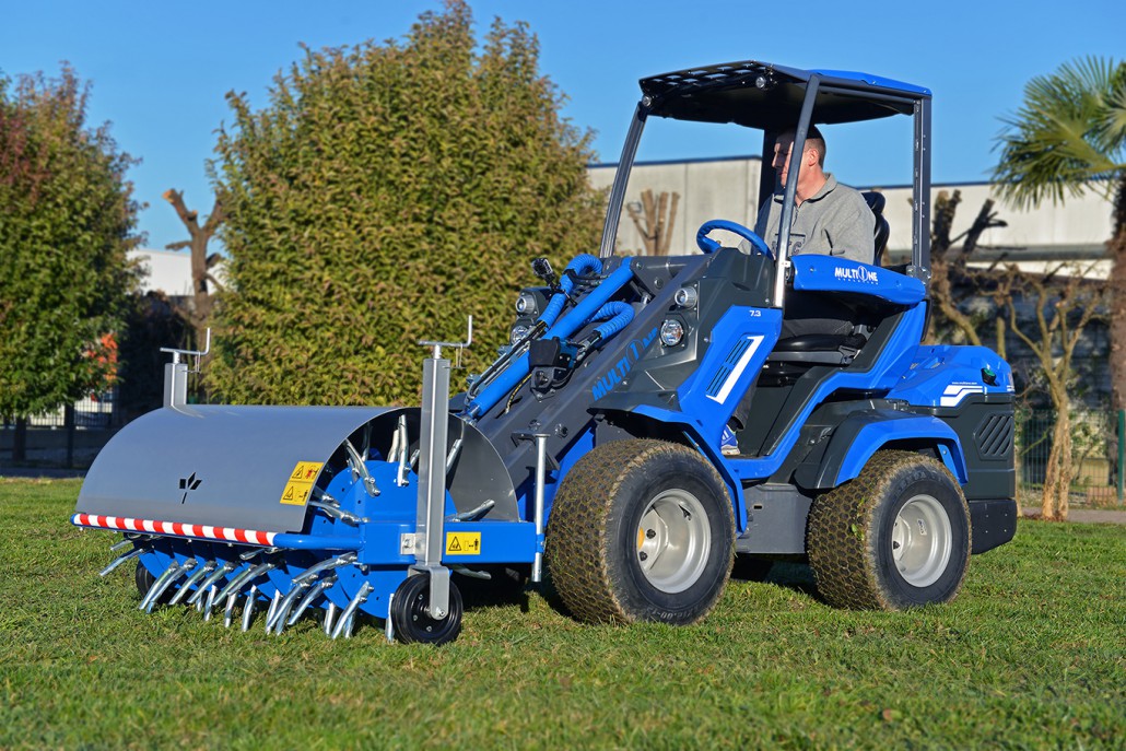 core aerator working in a garden