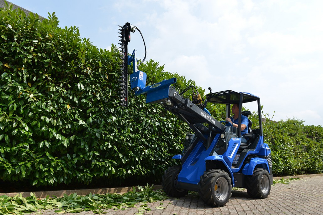 hedge trimmer at work seen from the front