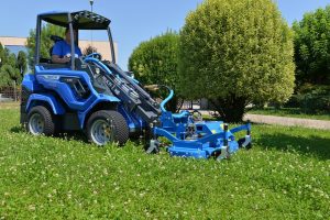 lawn mower in a daisies field