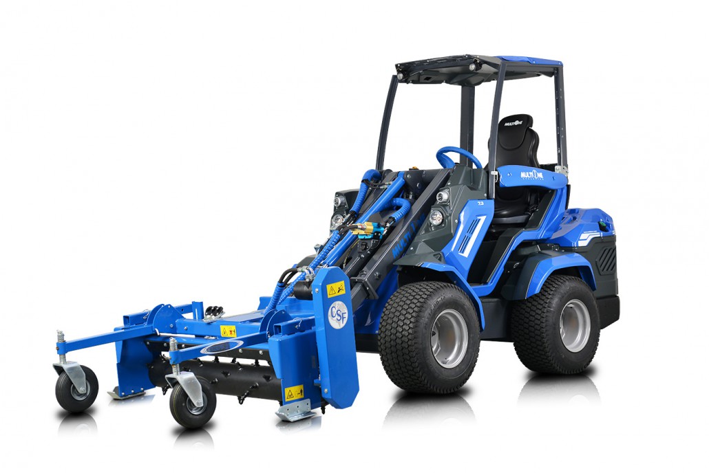 full view of the left side of a power rake assembled on a mini loader