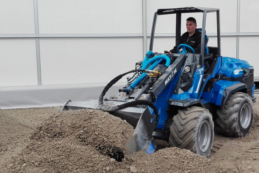 screening bucket moving soil and debris