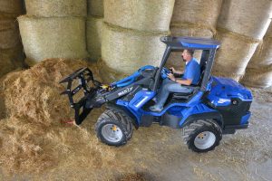 silage fork moving hay