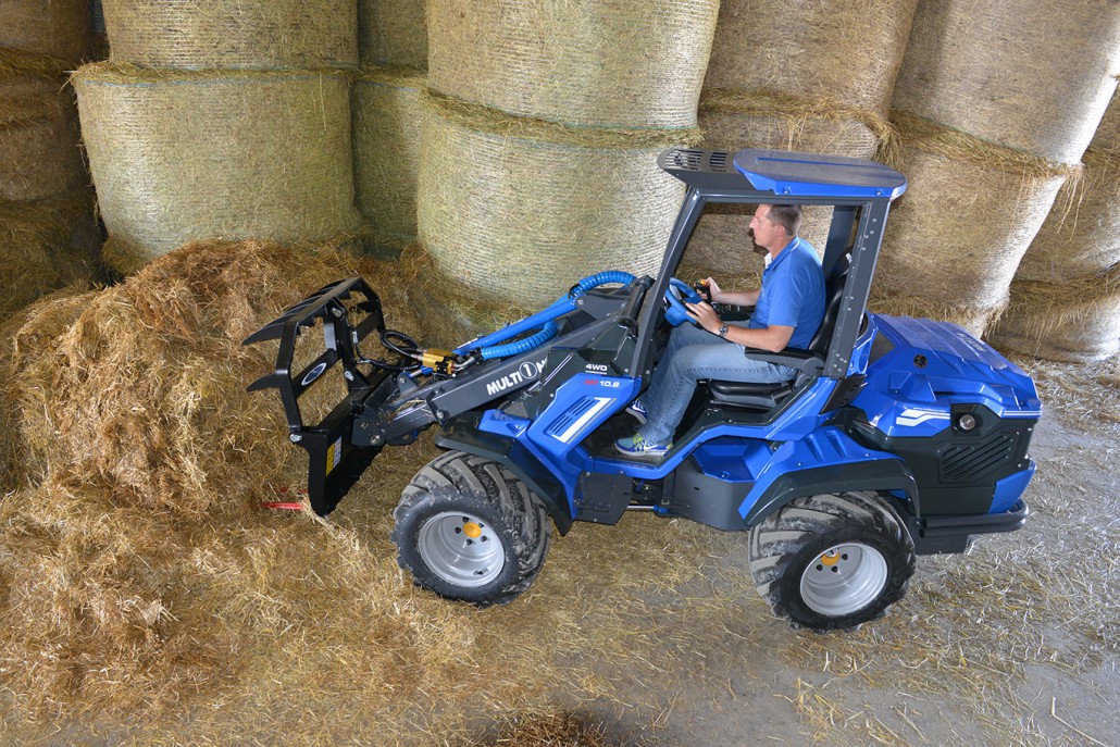 silage fork moving hay