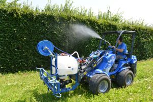 sprayer on a series of bushes